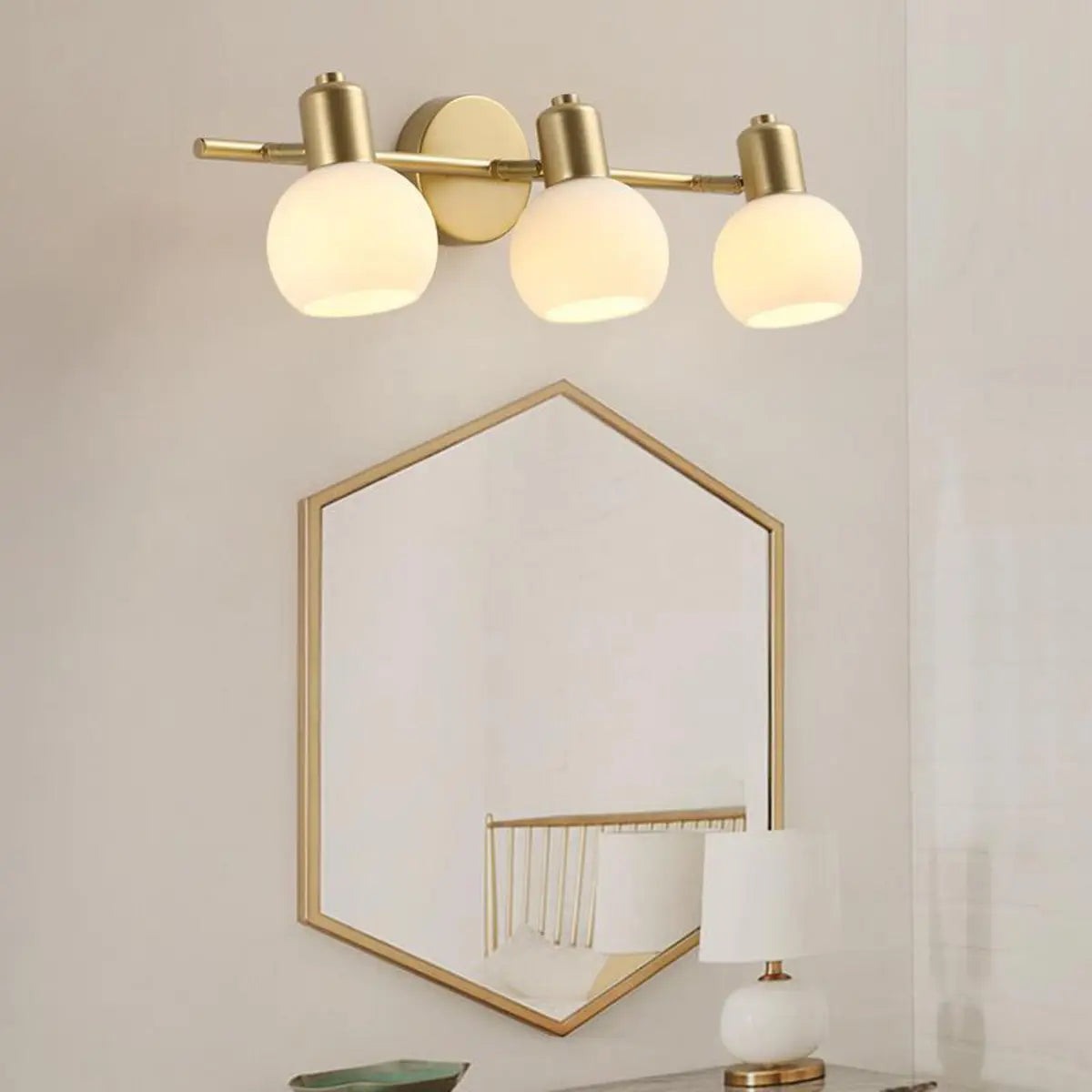 3-Light Adjustable Modern Brass Globe Vanity Light Image - 4