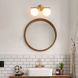 3-Light Modern Round Glass Brass LED Vanity Lights Image - 6