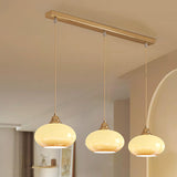 3-Light Simple Amber Drum Glass Island Light Fixture Image - 9