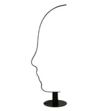 Artistic Black Face-Shaped Linear Metal Floor Lamp Image - 2