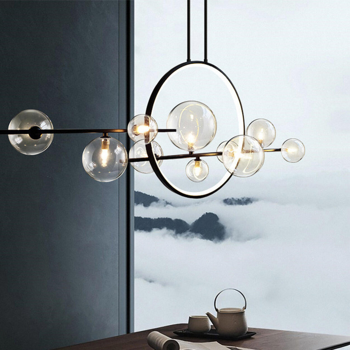 Artistic Black Globe and Ring Island Pendant Light Image - 15