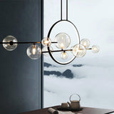 Artistic Black Globe and Ring Island Pendant Light Image - 15