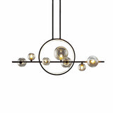 Artistic Black Globe and Ring Island Pendant Light Image - 2