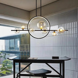 Artistic Black Globe and Ring Island Pendant Light Image - 4