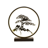 Artistic Black Pine Silhouette Circle Decor Table Lamp Image - 4