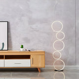 Artistic Modern Stacked Ring LED Bedside Floor Lamp Image - 11