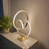 Artistic Stylish Gold Spiral Strip Metal Table Lamp Image - 2