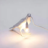 Artistic White Bird Shaped Resin Bedroom Table Lamp Image - 4