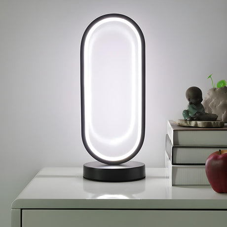 Bedroom Black Oval LED Minimalist Metal Table Lamp Image - 1