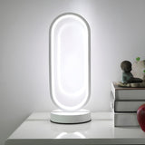 Bedroom Black Oval LED Minimalist Metal Table Lamp Image - 3