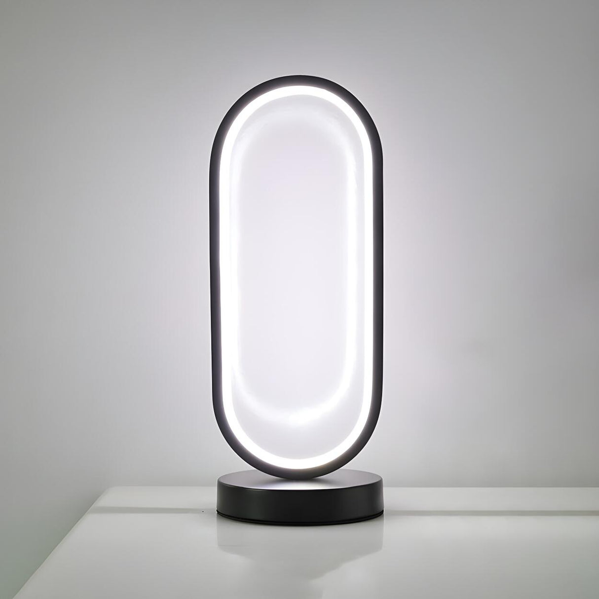 Bedroom Black Oval LED Minimalist Metal Table Lamp Image - 6