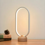 Bedroom Minimalist White Oval LED Decor Table Lamp Image - 1