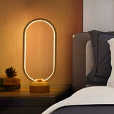 Bedroom Minimalist White Oval LED Decor Table Lamp Image - 11