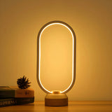 Bedroom Minimalist White Oval LED Decor Table Lamp Image - 12