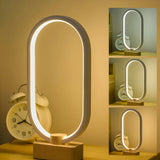 Bedroom Minimalist White Oval LED Decor Table Lamp Image - 4