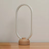 Bedroom Minimalist White Oval LED Decor Table Lamp Image - 6