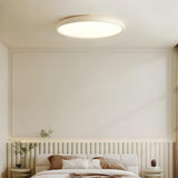 Bedroom Minimalist White Round LED Flush Mount Light Image - 1