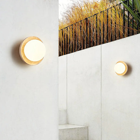 Beige Waterproof Modern Round Stone Outdoor Wall Lamp Image - 1