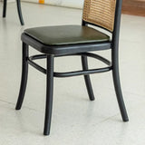 Black Leather Upholstered Seat Rattan Back Dining Chair Image - 4