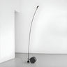 Black Minimalist Weighted Base Arched Floor Lamp Image - 1