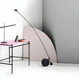 Black Minimalist Weighted Base Arched Floor Lamp Image - 5