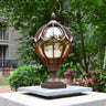 Brass Finish Elegant Globe Metal Outdoor Column Light Image - 2