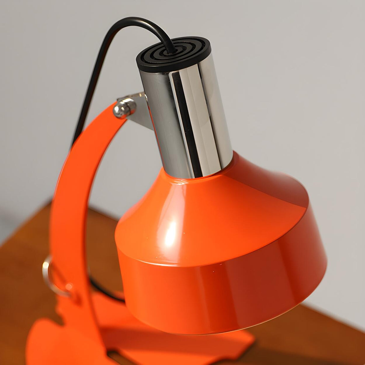 Chic Orange Cone Shade Curved Arm Metal Table Lamp Image - 10