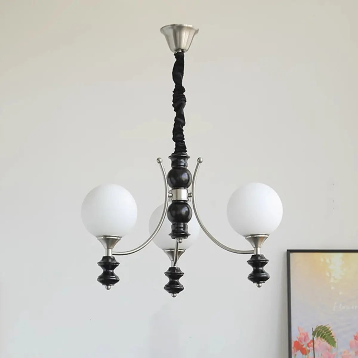 Classic Black Round Metal Globe Adjustable Height Chandelier Image - 2