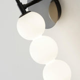 Contemporary Black Vertical Globe Wall Sconce Image - 10