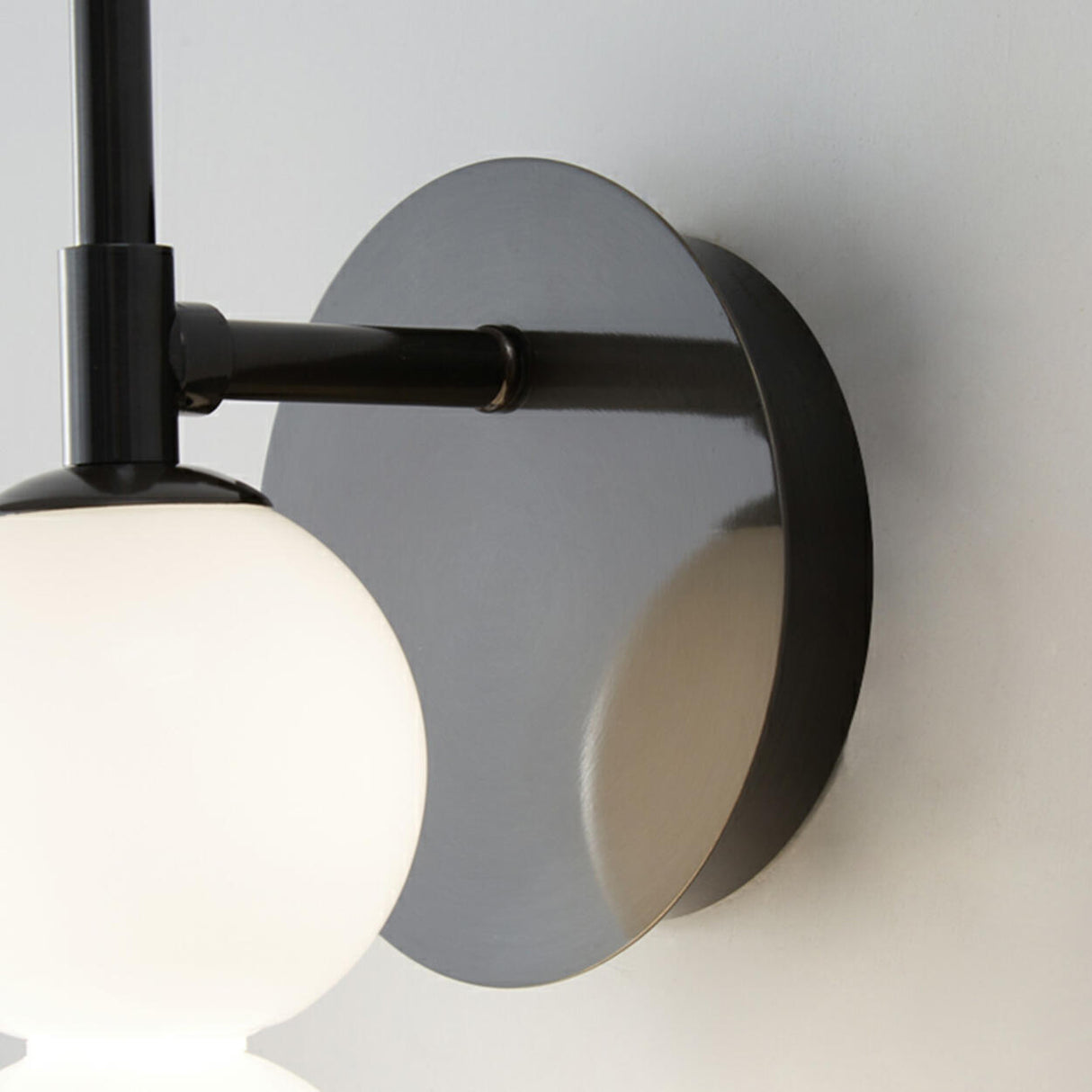 Contemporary Black Vertical Globe Wall Sconce Image - 9