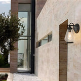 Contemporary Clear Glass LED Outdoor Mini Wall Sconce Image - 1