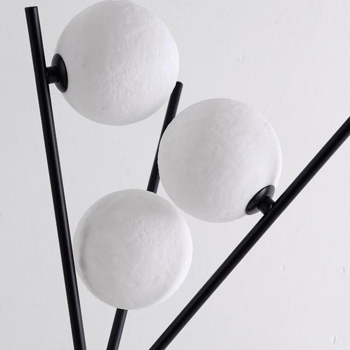 Contemporary Multi-Sphere Black Tripod Floor Lamp Image - 9