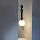 Contemporary Sculpted Black and White Globe Pendant Light Image - 4