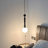 Contemporary Sculpted Black and White Globe Pendant Light Image - 6