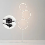 Creative Black Multi-Ring Metal and Silica Gel Floor Lamp Image - 10