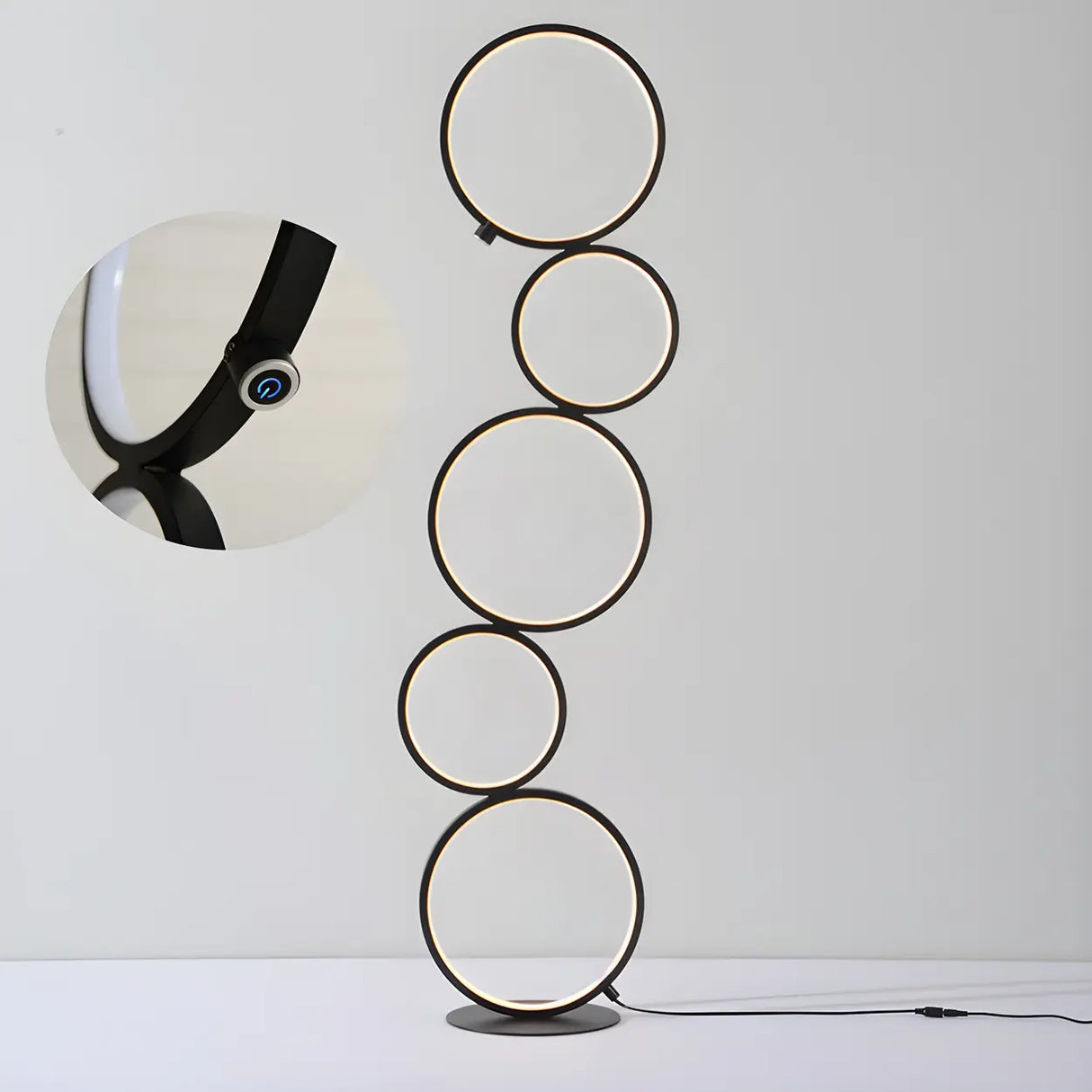 Creative Black Multi-Ring Metal and Silica Gel Floor Lamp Image - 11