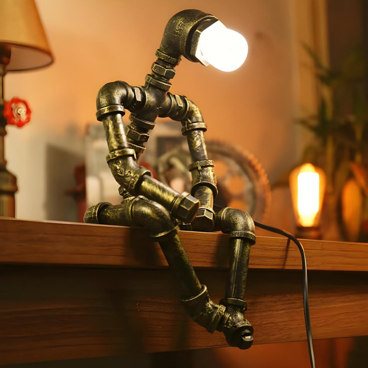 Creative Industrial Robot Warm Light Bronze Table Lamp Image - 4