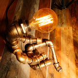 Creative Industrial Robot Warm Light Bronze Table Lamp Image - 6