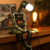 Creative Industrial Robot Warm Light Bronze Table Lamp Image - 7