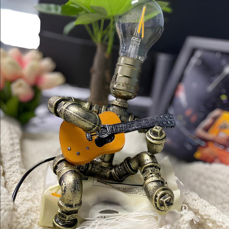 Creative Industrial Sitting Guitar Robot Table Lamp Image - 1