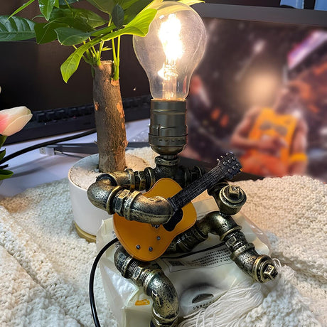 Creative Industrial Sitting Guitar Robot Table Lamp Image - 2