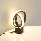 Creative Linear Circle LED Metal Bedroom Table Lamp Image - 4