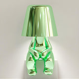 Creative Macaron Metal Man LED Bedroom Table Lamp Image - 3