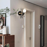 Creative Round Bulb Climbing Figure Wall Sconce Image - 2