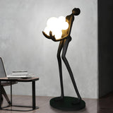 Creative Sculptural Human Figure and Globe Floor Lamp Image - 1