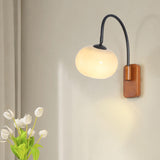 Curved Metal Arm Wood and Glass Drum Wall Sconce Image - 7