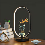 Elegant Deer Statue Oval Frame LED Metal Table Lamp Image - 1