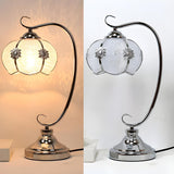 Elegant Dome Glass Shade Curved Metal Arm Table Lamp Image - 11