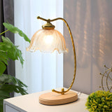 Elegant Flower-Shaped Glass Gold Finish Arm Table Lamp Image - 1