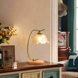 Elegant Flower-Shaped Glass Gold Finish Arm Table Lamp Image - 2